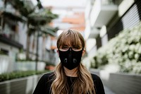 Woman wearing a face mask in public during coronavirus pandemic