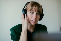 Woman listening to music  during coronavirus quarantine
