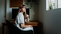 Woman sitting in front of a computer during coronavirus quarantine