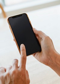 Woman using a mobile phone during coronavirus quarantine