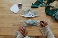 Woman making a diy face mask during the coronavirus pandemic