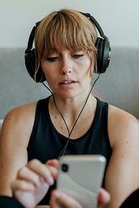 Woman listening to music during coronavirus quarantine