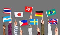 Hands holding international flags