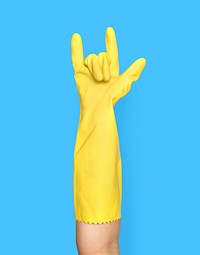 Hand in yellow cleaning glove gesture with handlove