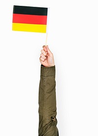 Hand holding flag isolated