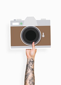 Hand holding a camera cardboard prop