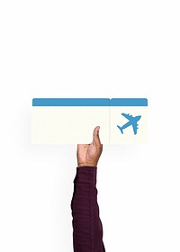 Hand holding a flight ticket