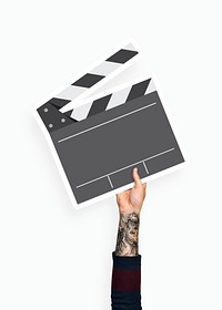 Hand holding a clapperboard prop