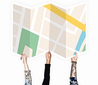 Hands holding a map cardboard prop