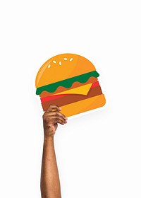 Hand holding a burger cardboard prop