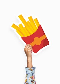 Hand holding a french fries cardboard prop