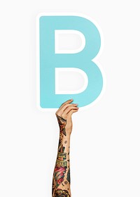 Hands holding the letter B