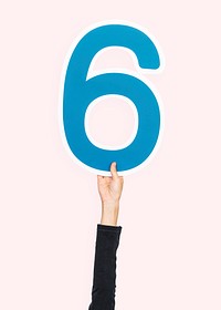 Hand holding number six sign