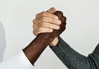 Closeup of diverse hands holding each other
