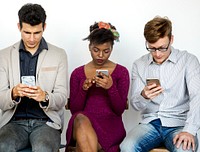 Group of diverse people using mobile phone