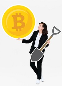 Businesswoman holding bitcoin cryptocurrency and mining concept icons