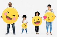 Happy family holding emoji icons