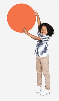 Happy kid holding an orange empty board