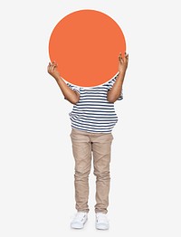 Kid holding an empty round orange board