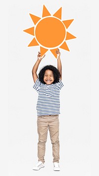 Cheerful boy holding a sun icon