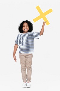 Cheerful boy holding a multiplication sign