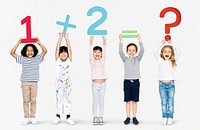 Cheerful diverse kids learning mathematics