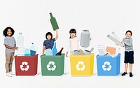 Happy diverse kids recycling garbage into bins
