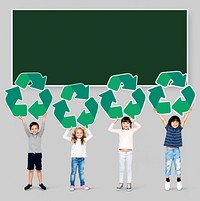Diverse kids holding recycling icons
