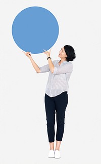 Woman presenting a blue round board