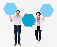 Diverse people showing blue hexagon shaped boards