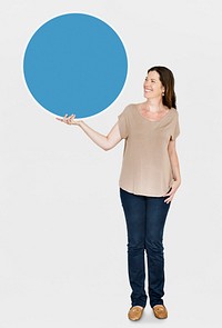 Happy woman holding a round board