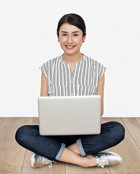 Happy woman using her laptop
