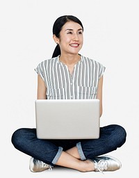 Happy woman using her laptop