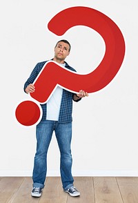 Confused man holding a question mark icon