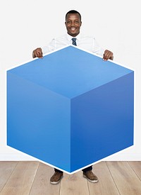 Businessman with a big blue cube