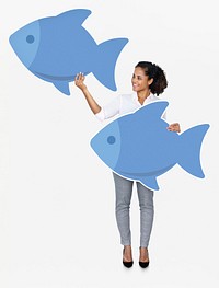 Happy woman holding blue fish icons