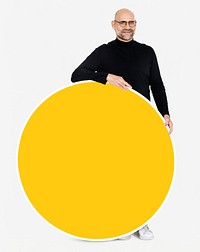 Man holding a round yellow board