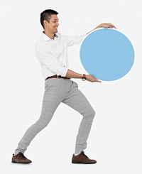 Happy man holding a round blue board