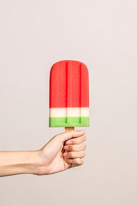 Hand with an ice pop in summertime