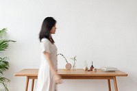 Young woman walking in a living room