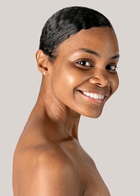 Nude African American woman smiling studio portrait