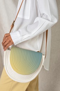 Black woman carrying a woven cotton rope bag mockup 