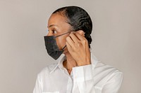Black woman wearing a black mask