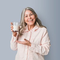 Cheerful senior woman drinking a glass of milk mockup