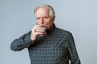 Senior man drinking a glass of water