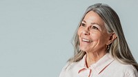 Happy senior woman in a studio shoot 