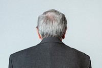 Rear view of a senior man in a suit 