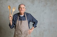 Senior American man wearing an apron