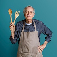 Senior American man wearing an apron