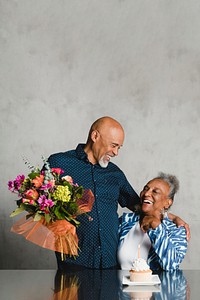 Senior woman celebrating her birthday with her husband 